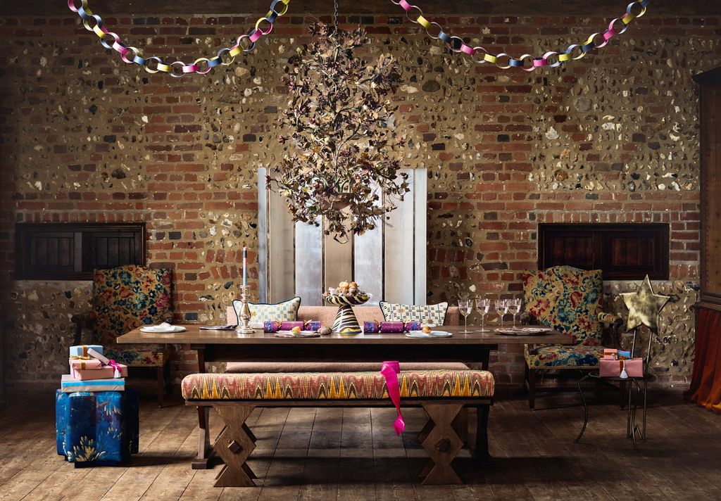 ‘The Marcel fumed oak dining table 12650 for medium  and matching oak bench 3200 from Rupert Bevan.  Bench seat cushion...