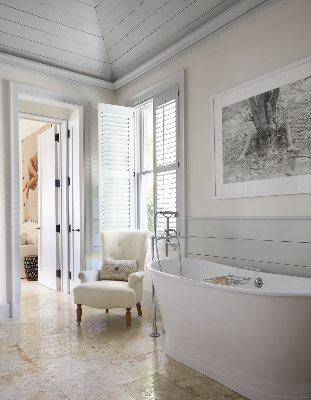 In the main bathroom a black and white photograph bought in Cuba provides an interesting focal point above the bath...