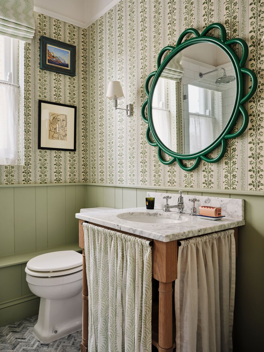 The bathroom in Daisy SimsHilditchs Notting Hill apartment is light and airy thanks to its sage green scheme. Daisy has...