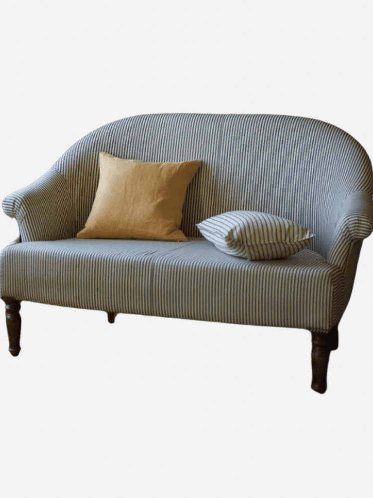 Image may contain: Couch, Furniture, Cushion, Home Decor, and Pillow