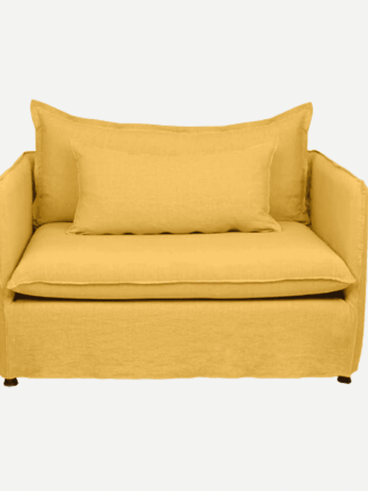 Image may contain: Cushion, Home Decor, Couch, Furniture, Chair, and Pillow