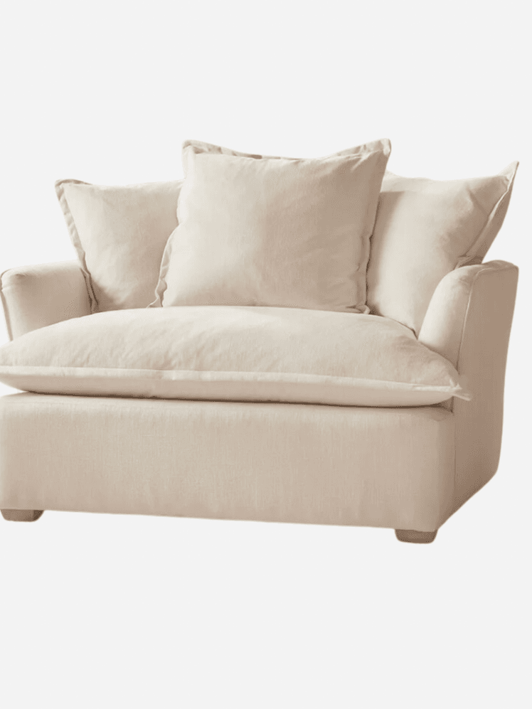 Image may contain: Cushion, Home Decor, Couch, Furniture, Pillow, and Chair