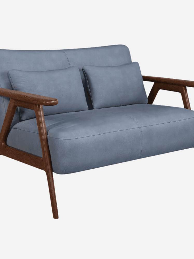 Image may contain: Cushion, Home Decor, Furniture, Chair, Couch, and Armchair