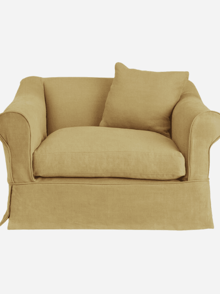 Image may contain: Cushion, Home Decor, Furniture, Chair, Couch, and Armchair