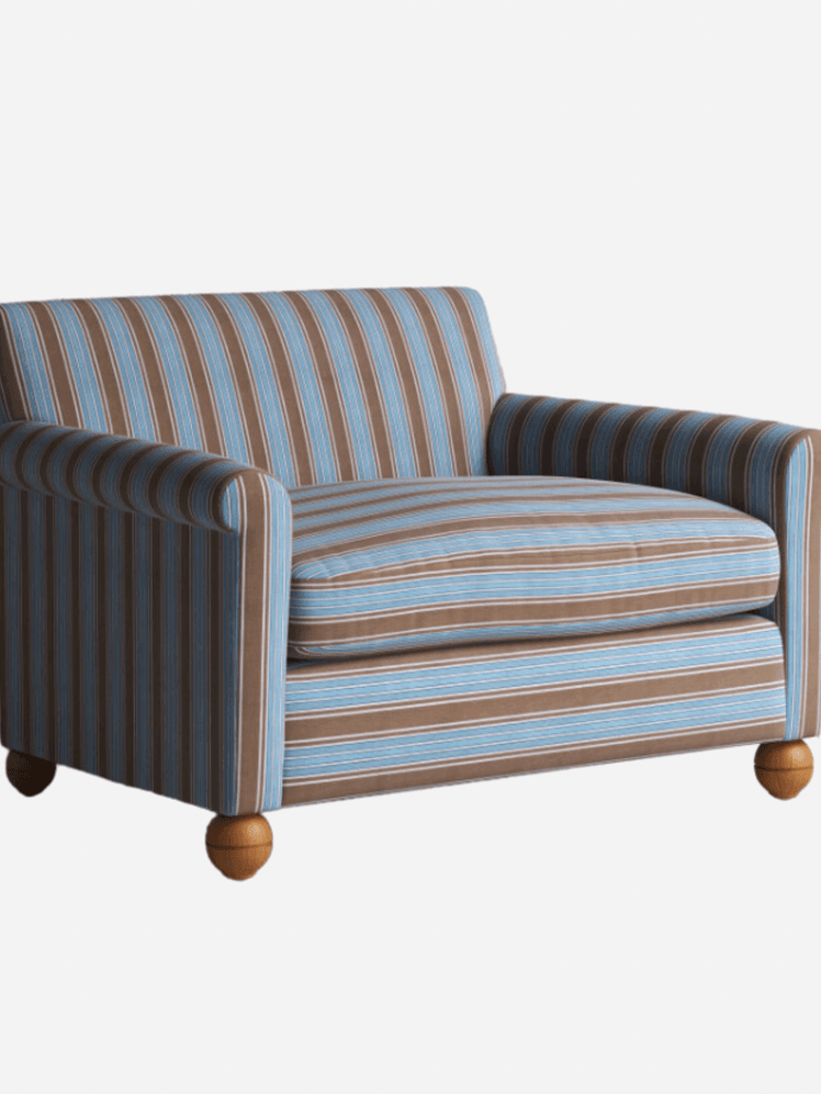 Image may contain: Furniture, Chair, Armchair, and Couch