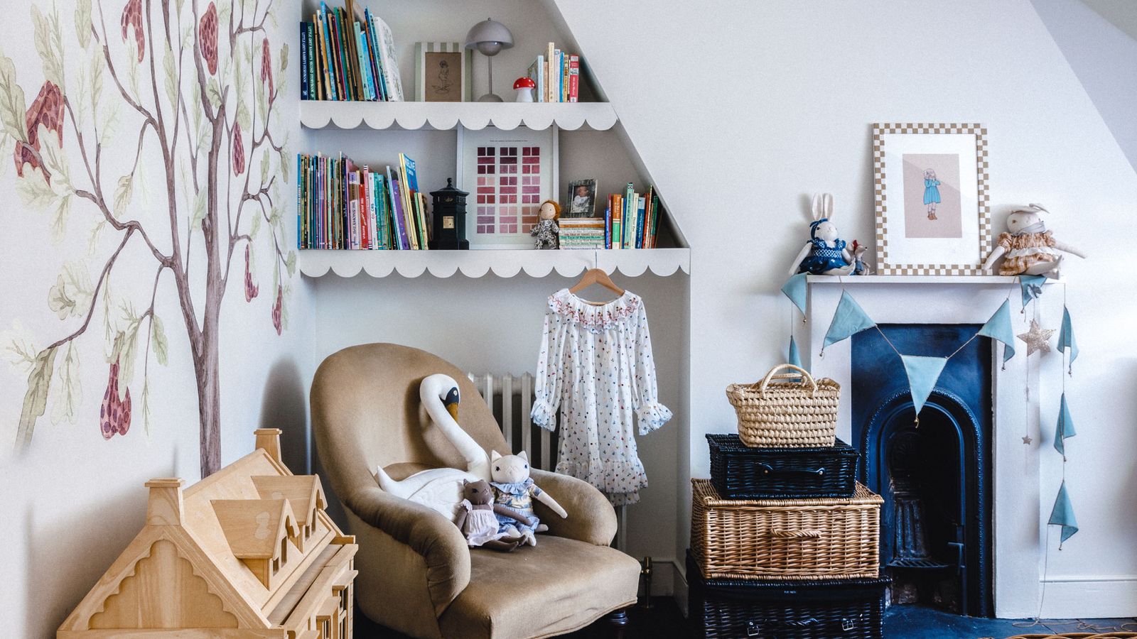 Image may contain: Home Decor, Art, Painting, Rug, Chair, Furniture, Box, Lamp, Person, Toy, Architecture, and Building