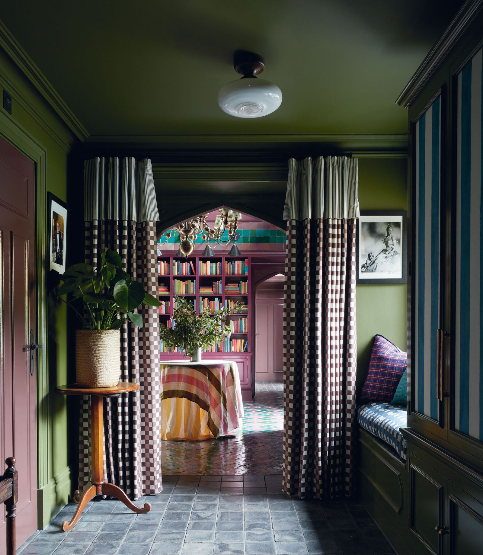 Image may contain Plant Desk Furniture Table Floor Lamp Art Painting Architecture Building and Indoors