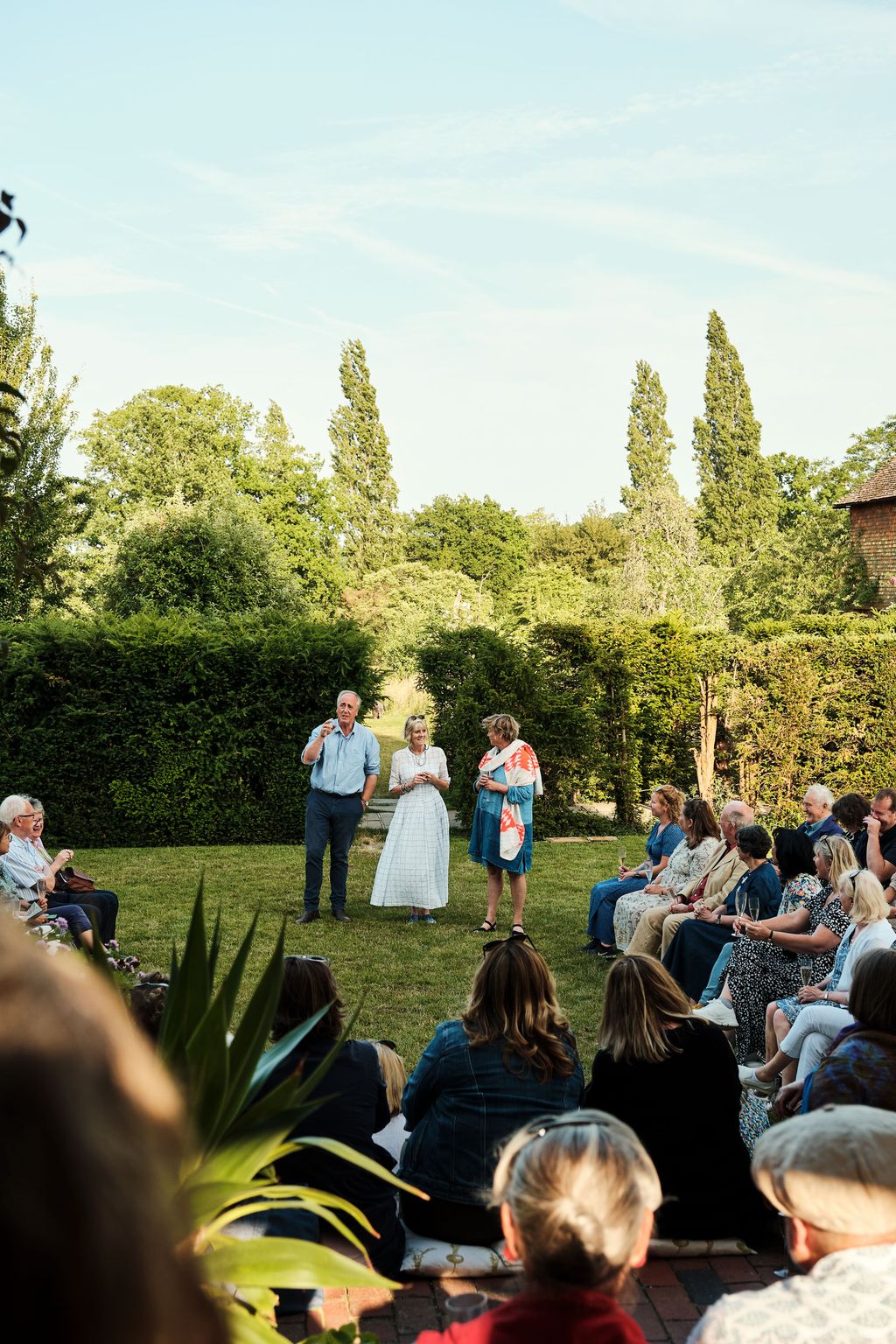 Image may contain Grass Nature Outdoors Park Plant Clothing Dress People Person Formal Wear Vegetation and Suit