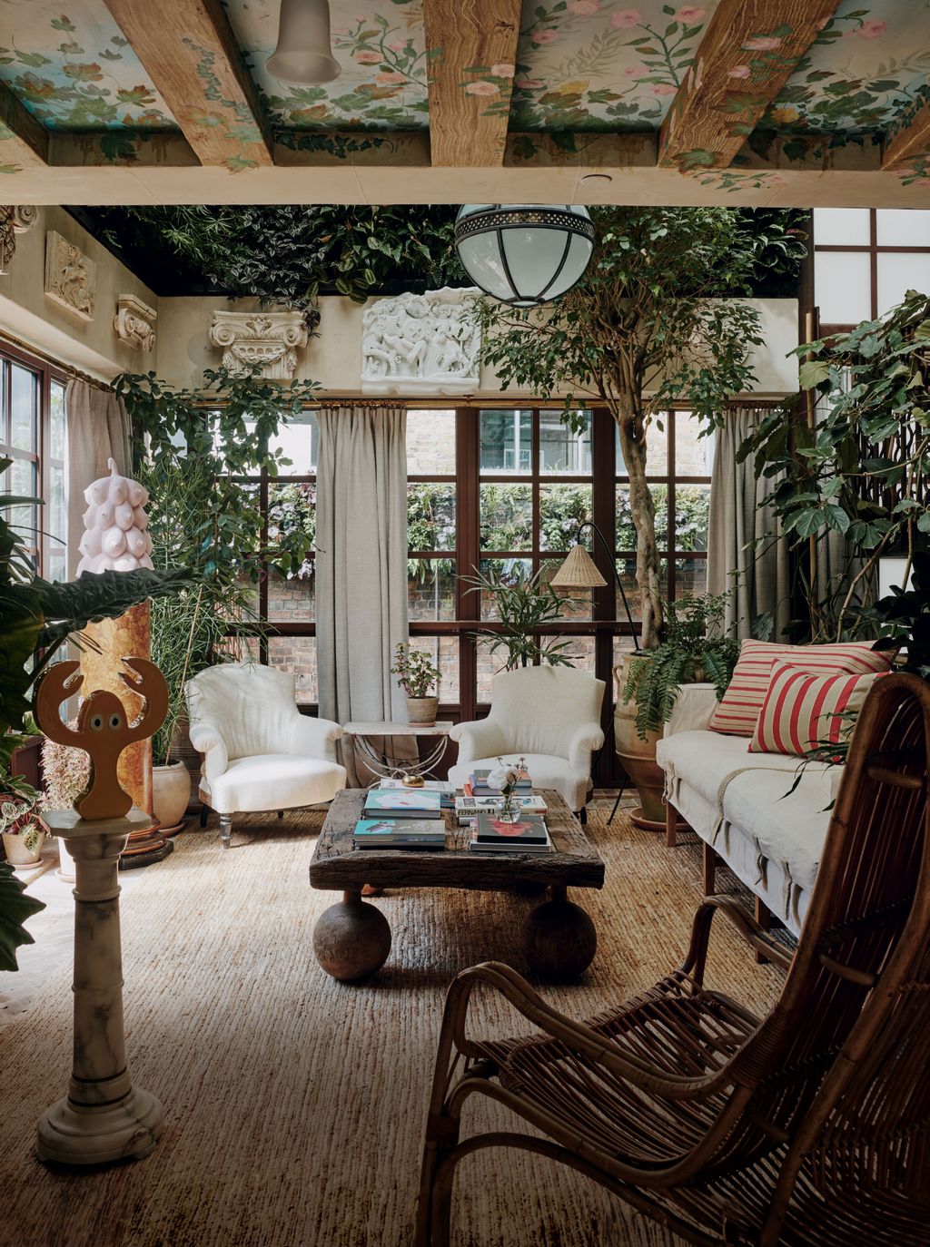 Image may contain Home Decor Plant Architecture Building Furniture Indoors Living Room Room and Interior Design