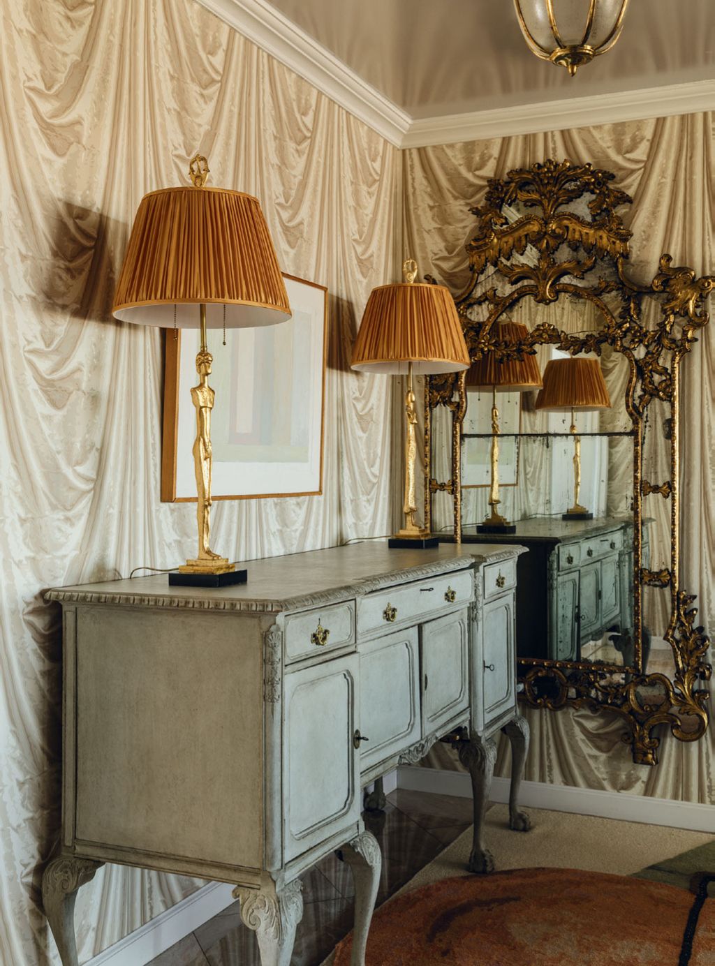 Image may contain Furniture Sideboard Indoors Interior Design Lamp Candle Art Painting and Home Decor