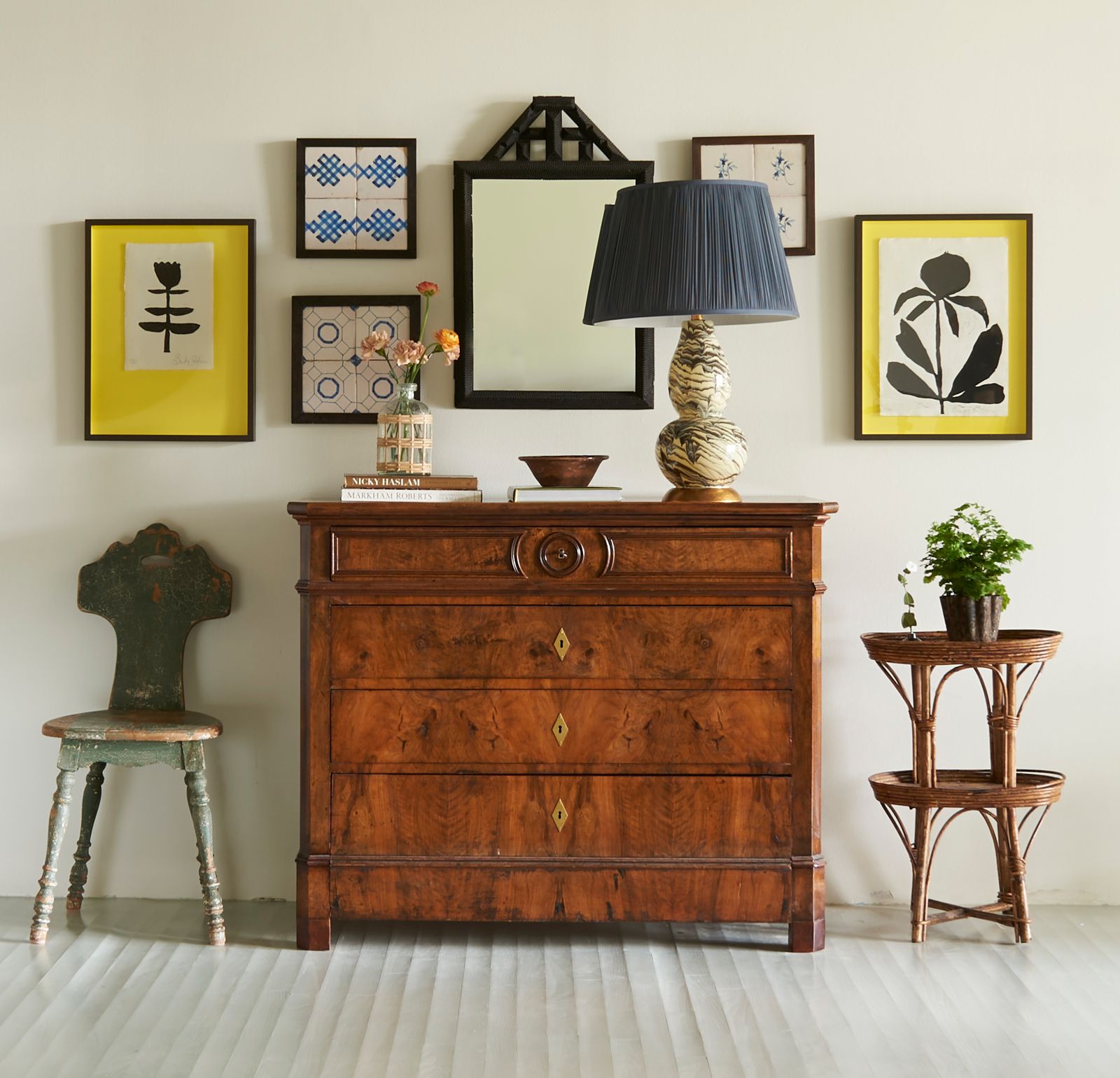 Image may contain Lamp Furniture Plant Chair Art Painting Chest Of Drawers Indoors and Interior Design