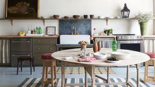 Image may contain Architecture Building Dining Room Dining Table Furniture Indoors Room Table and Home Decor