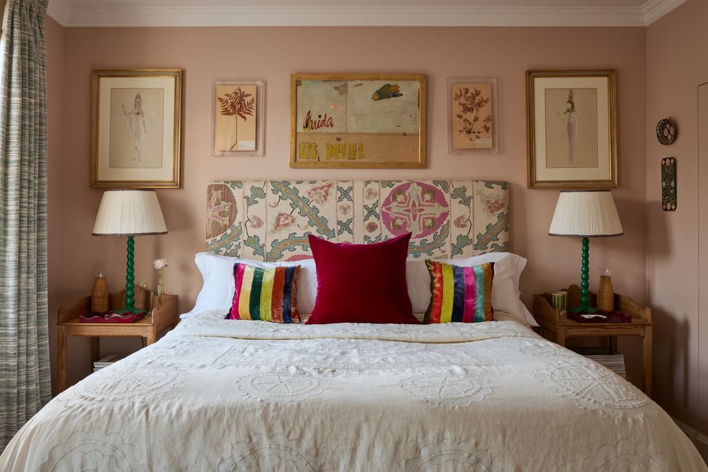 Image may contain Cushion Home Decor Lamp Table Lamp Art Painting Bed Furniture Pillow Person and Indoors