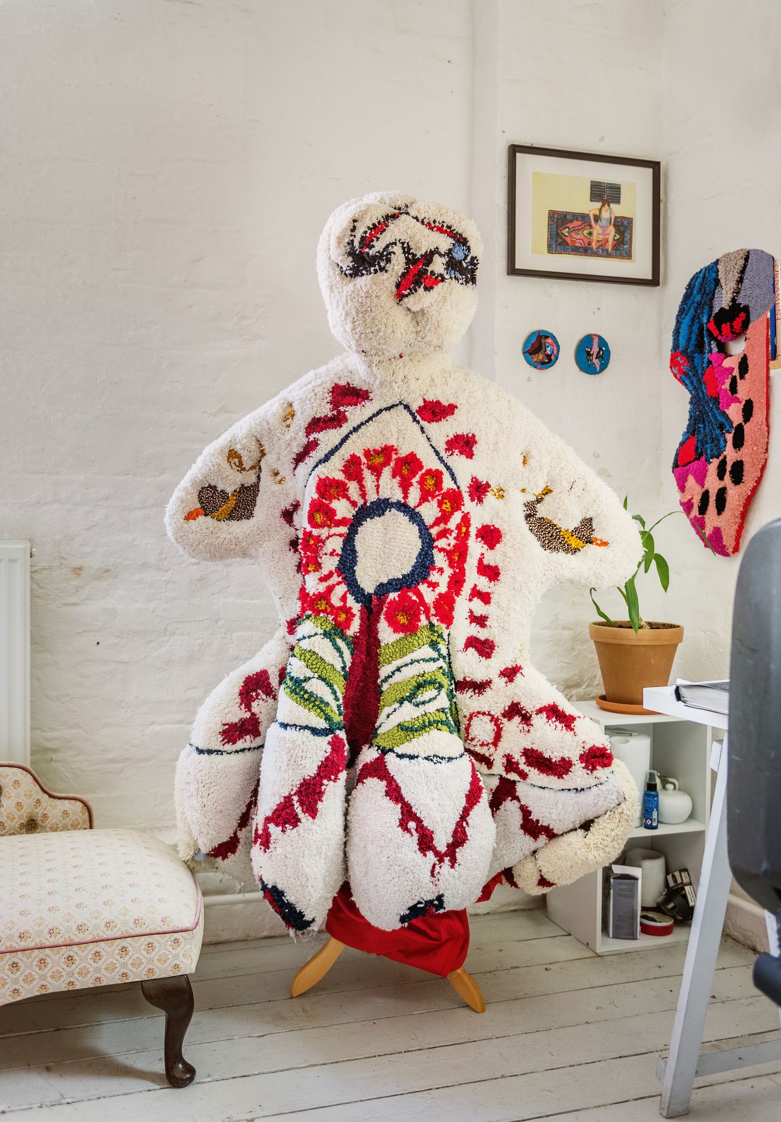 Image may contain Plant Chair Furniture Art Painting Toy and Person