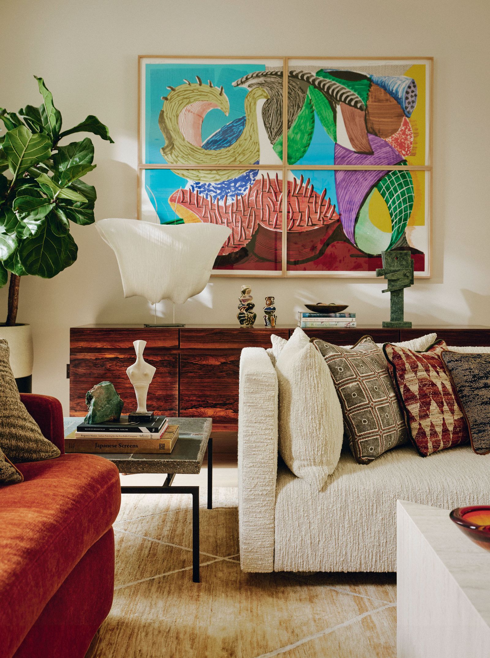 Image may contain Home Decor Plant Architecture Building Furniture Indoors Living Room Room Cushion and Couch