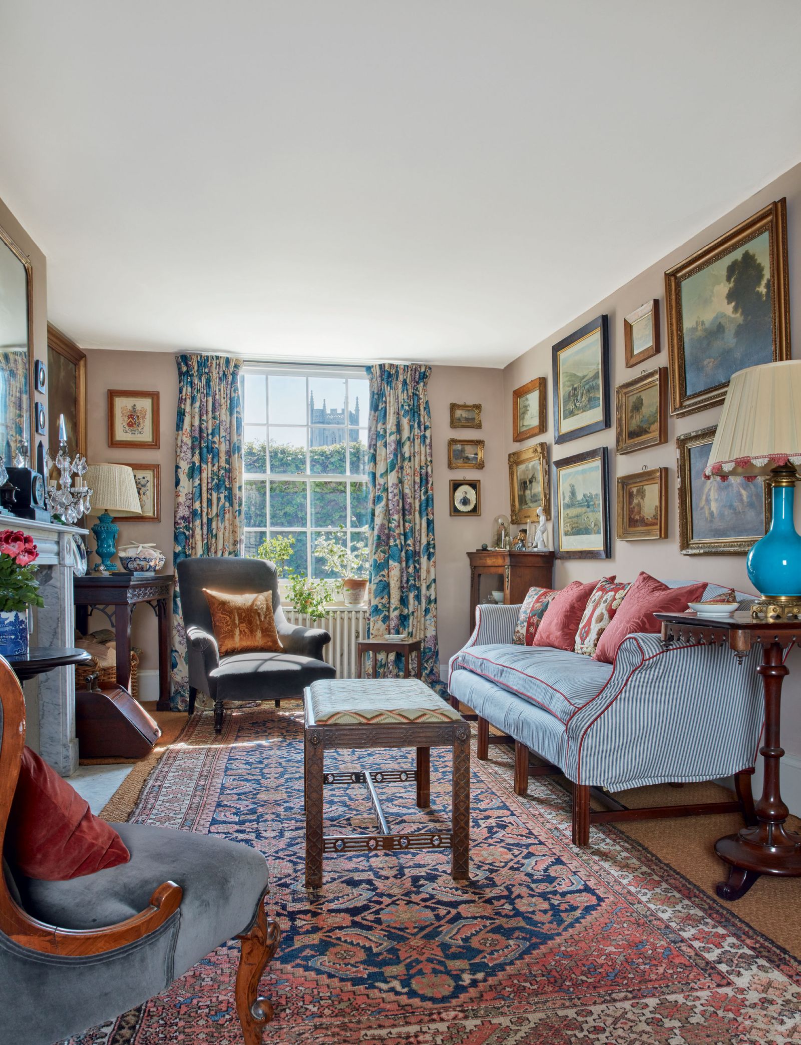 Image may contain Home Decor Rug Architecture Building Furniture Indoors Living Room Room Lamp Couch and Art