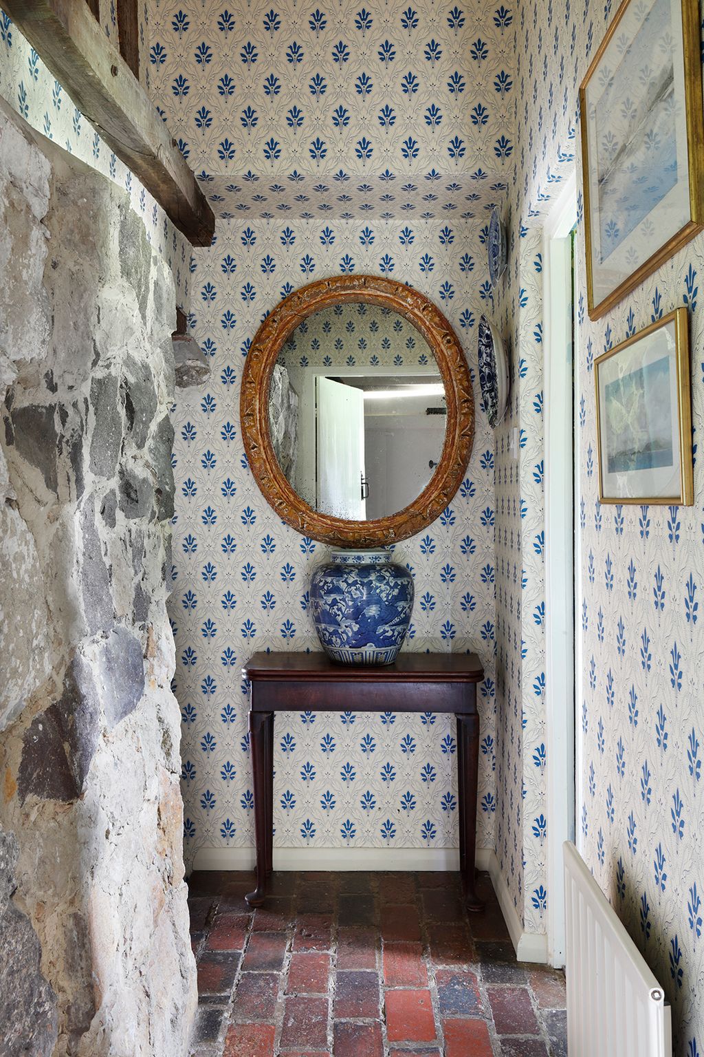 Image may contain Floor Indoors Interior Design Art Painting Flooring Desk Furniture Table and Architecture