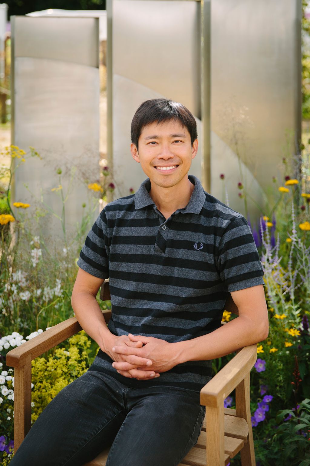 Image may contain Takashi Fujii Plant Potted Plant Face Head Person Photography Portrait Happy Smile and Clothing