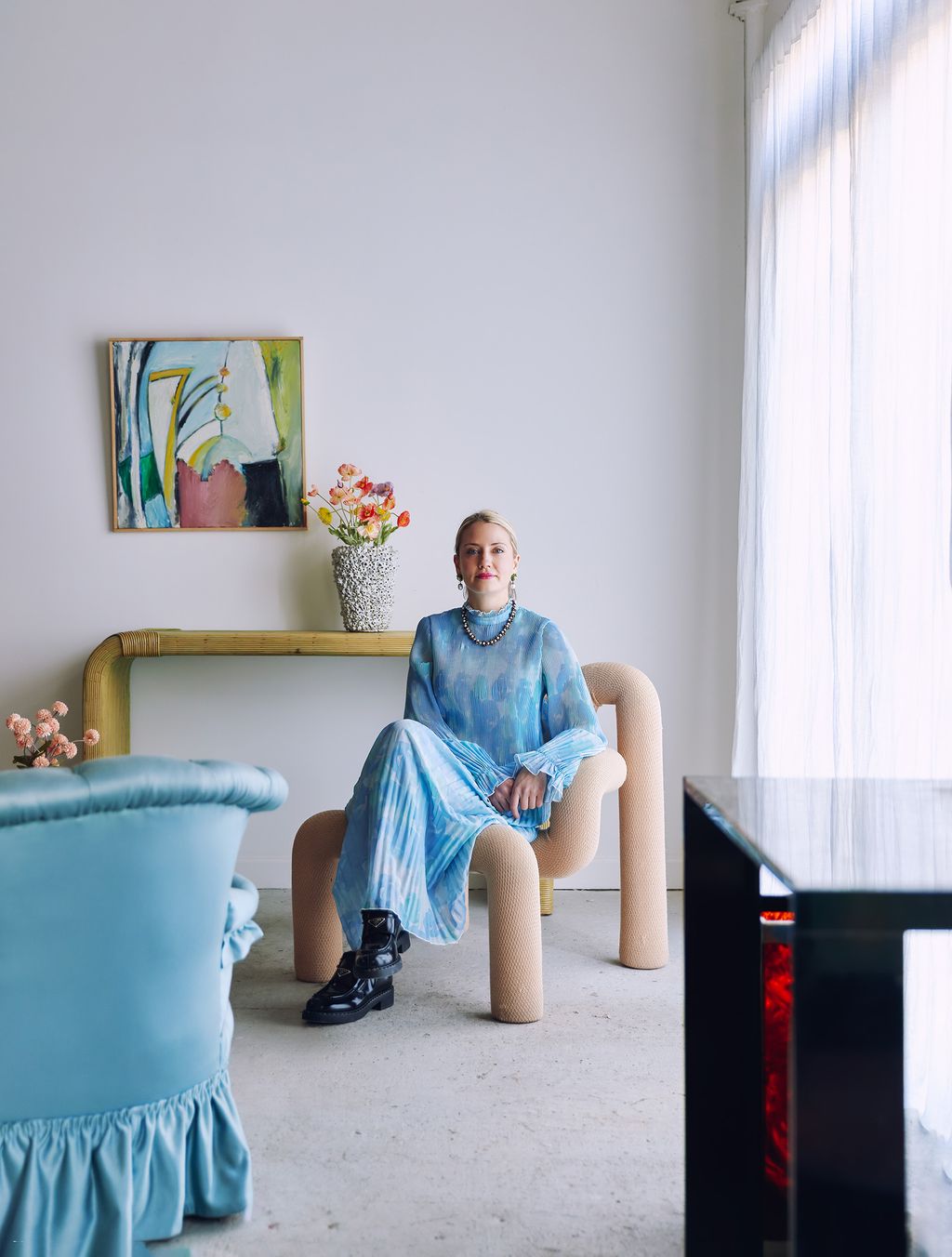 Image may contain Person Sitting Chair Furniture Accessories Jewelry Necklace Art and Painting