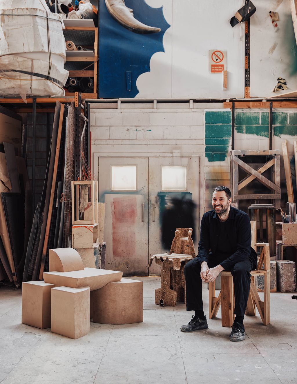 Image may contain Clothing Footwear Shoe Adult Person Chair Furniture Wood Box Architecture Building and Factory