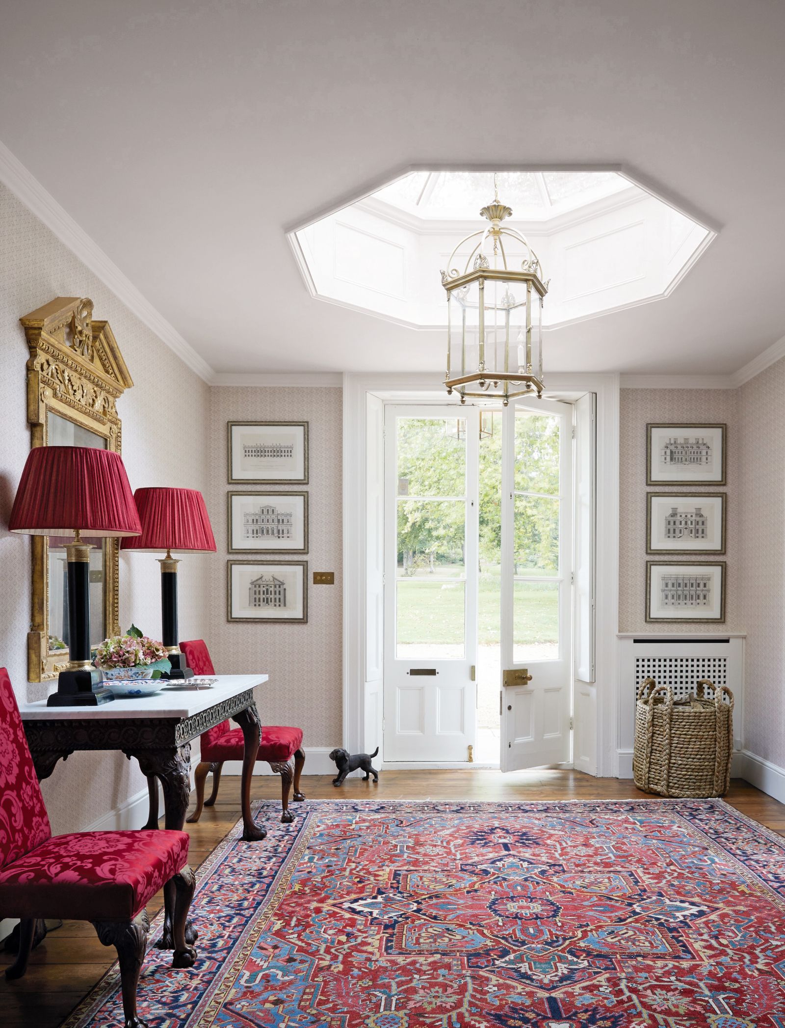 Image may contain Home Decor Lamp Rug Chair Furniture Art Painting Animal Canine Dog Mammal Pet Desk and Table