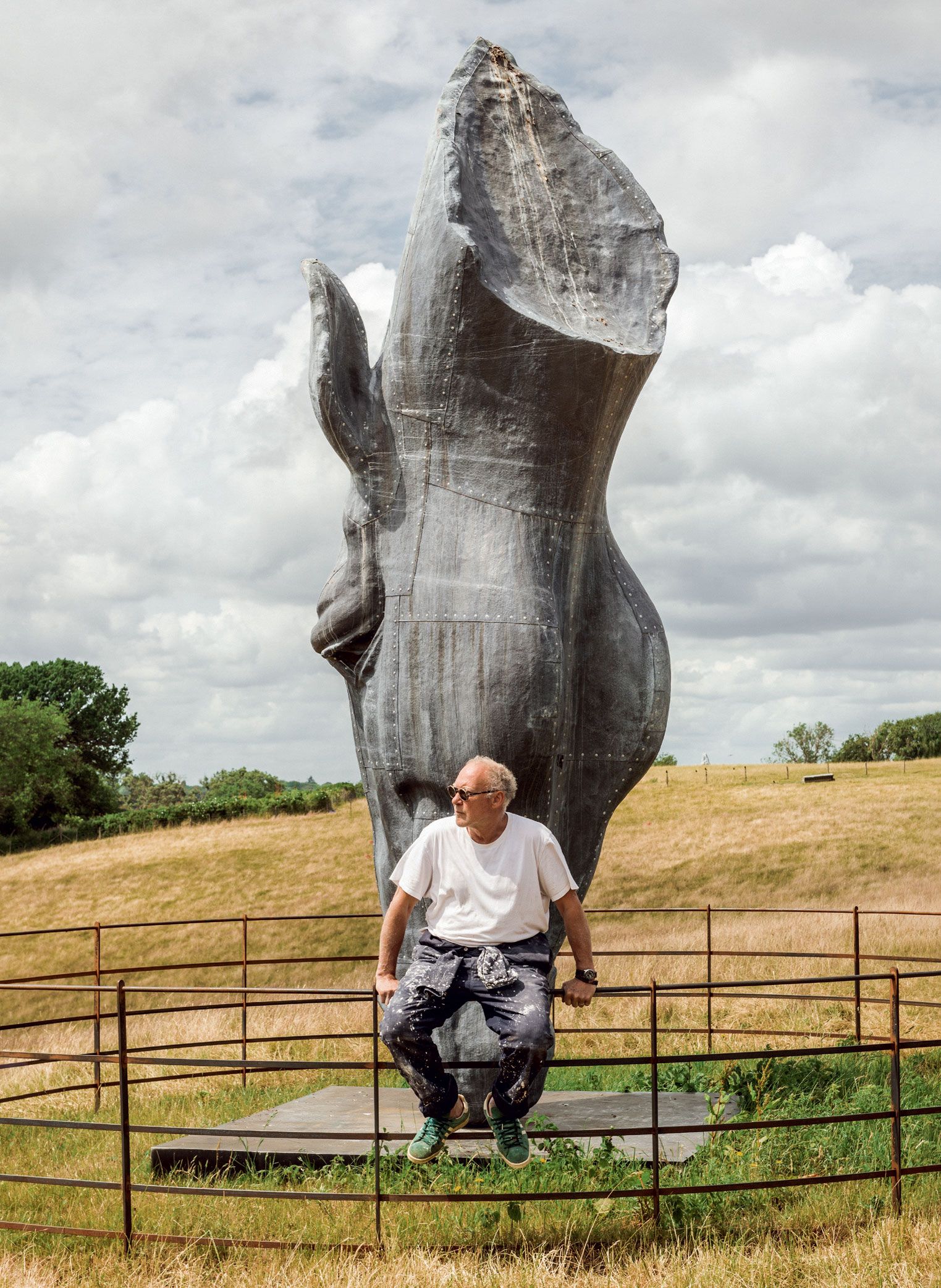 Image may contain Face Head Person Photography Portrait Clothing Pants Grass Plant Nature Outdoors and Park