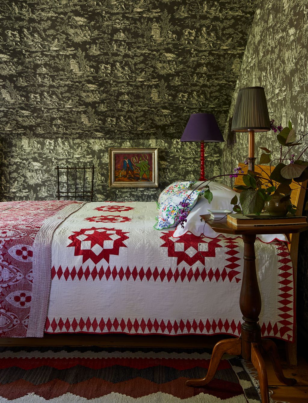 Image may contain Lamp Art Painting Table Lamp Furniture Bed Book Publication Bed Sheet Plant and Indoors