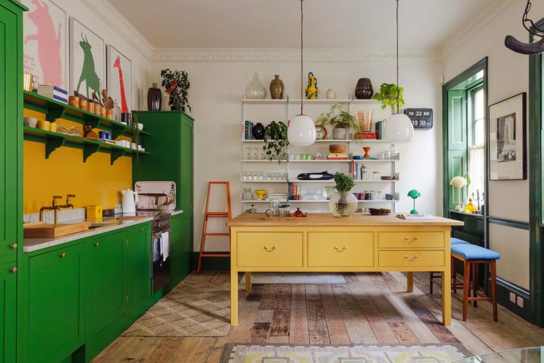 Image may contain: Indoors, Interior Design, Home Decor, Kitchen, Plant, Rug, Desk, Furniture, Table, Lamp, Food, and Fruit