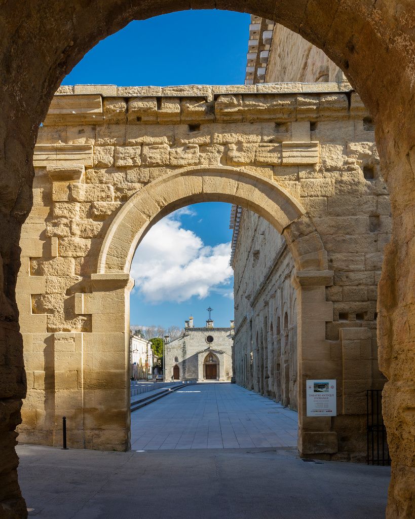 Image may contain Arch Architecture Car Transportation Vehicle City Road Street and Urban