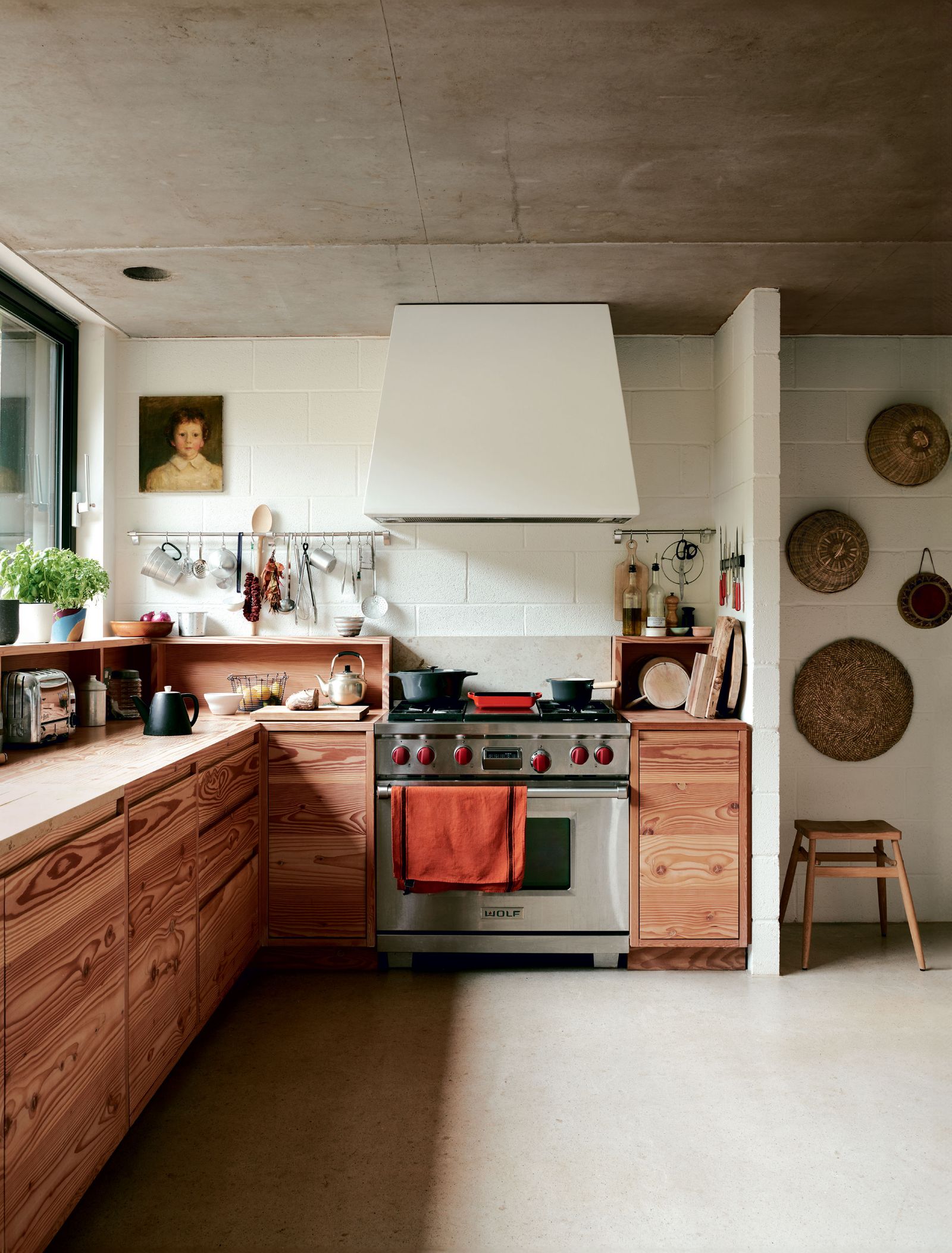 Image may contain Indoors Interior Design Kitchen Cooktop Cup Art Painting Plate and Plant