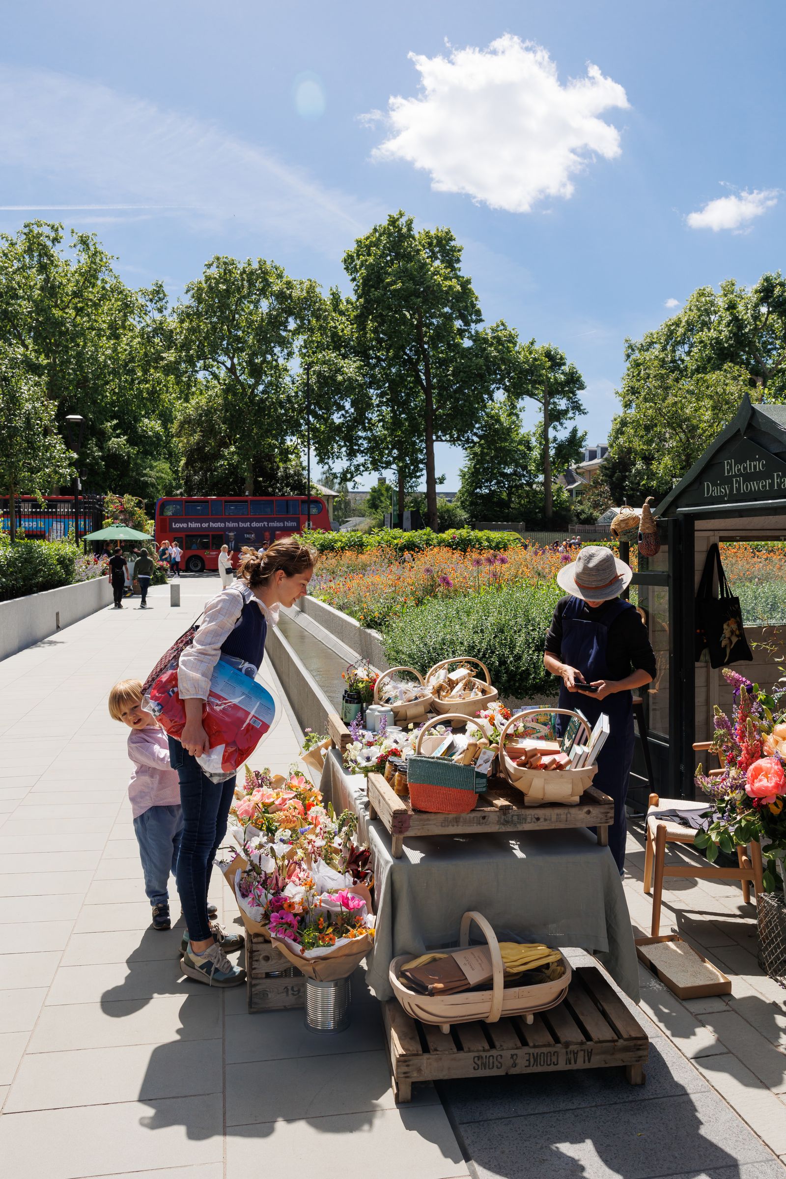 Image may contain Clothing Hat Footwear Shoe Accessories Bag Handbag Adult Person Child Bus and Transportation