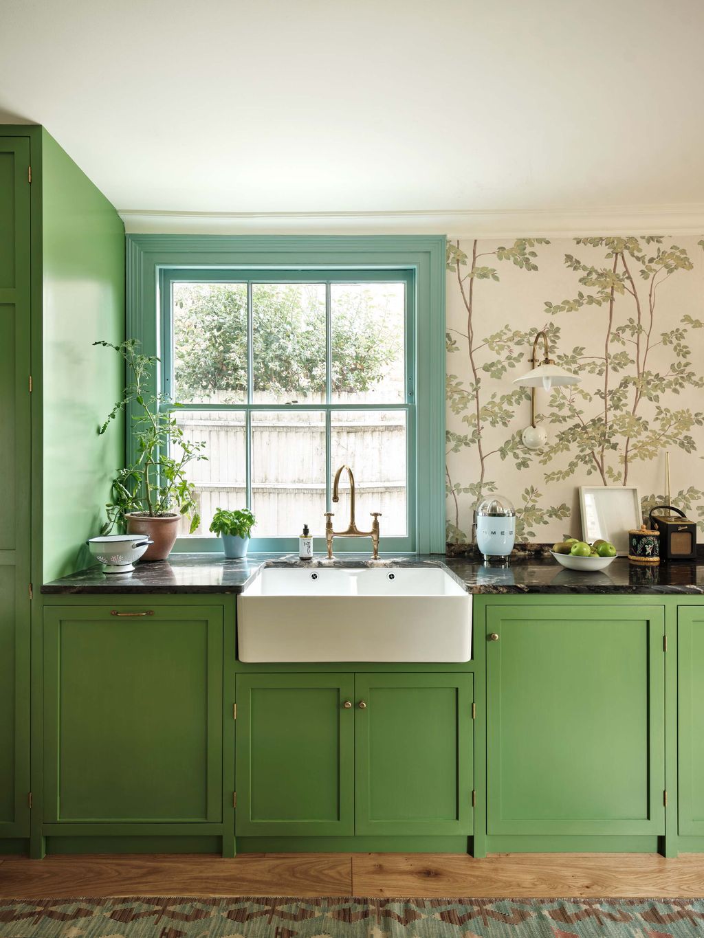 Image may contain Sink Sink Faucet Plant Indoors Interior Design Plate Window Home Decor and Rug