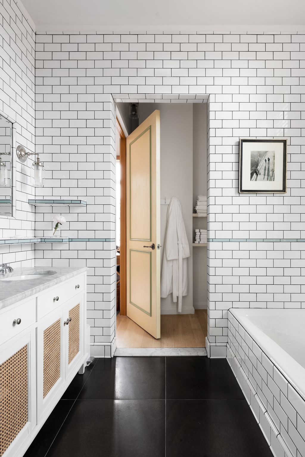 Image may contain Indoors Interior Design Art Painting Sink Bathing Bathtub Person Tub and Sink Faucet