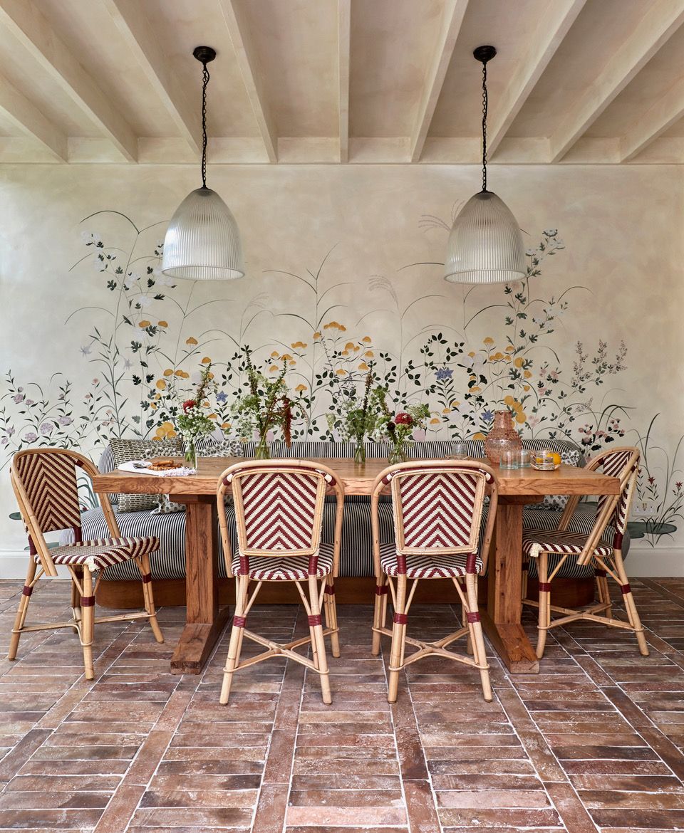 Image may contain Floor Indoors Interior Design Architecture Building Dining Room Dining Table Furniture and Room