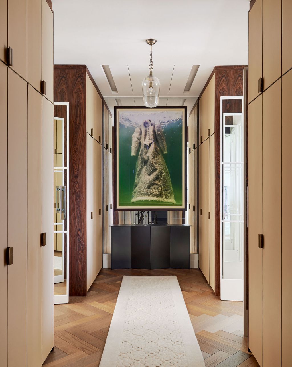 Image may contain Indoors Interior Design Art Painting Lamp Floor Hallway Architecture Building and Foyer