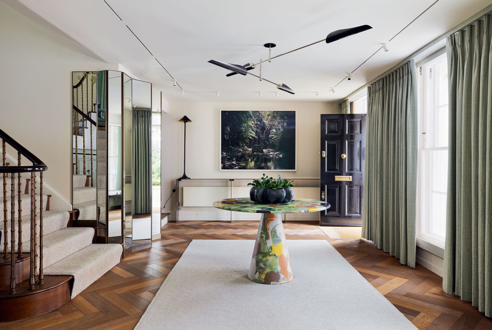 Image may contain Plant Home Decor Rug Indoors Architecture Building Foyer Appliance Ceiling Fan and Device