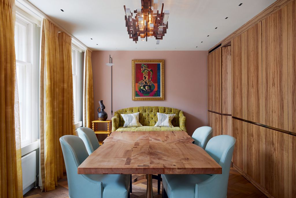 Image may contain Architecture Building Dining Room Dining Table Furniture Indoors Room Table and Interior Design