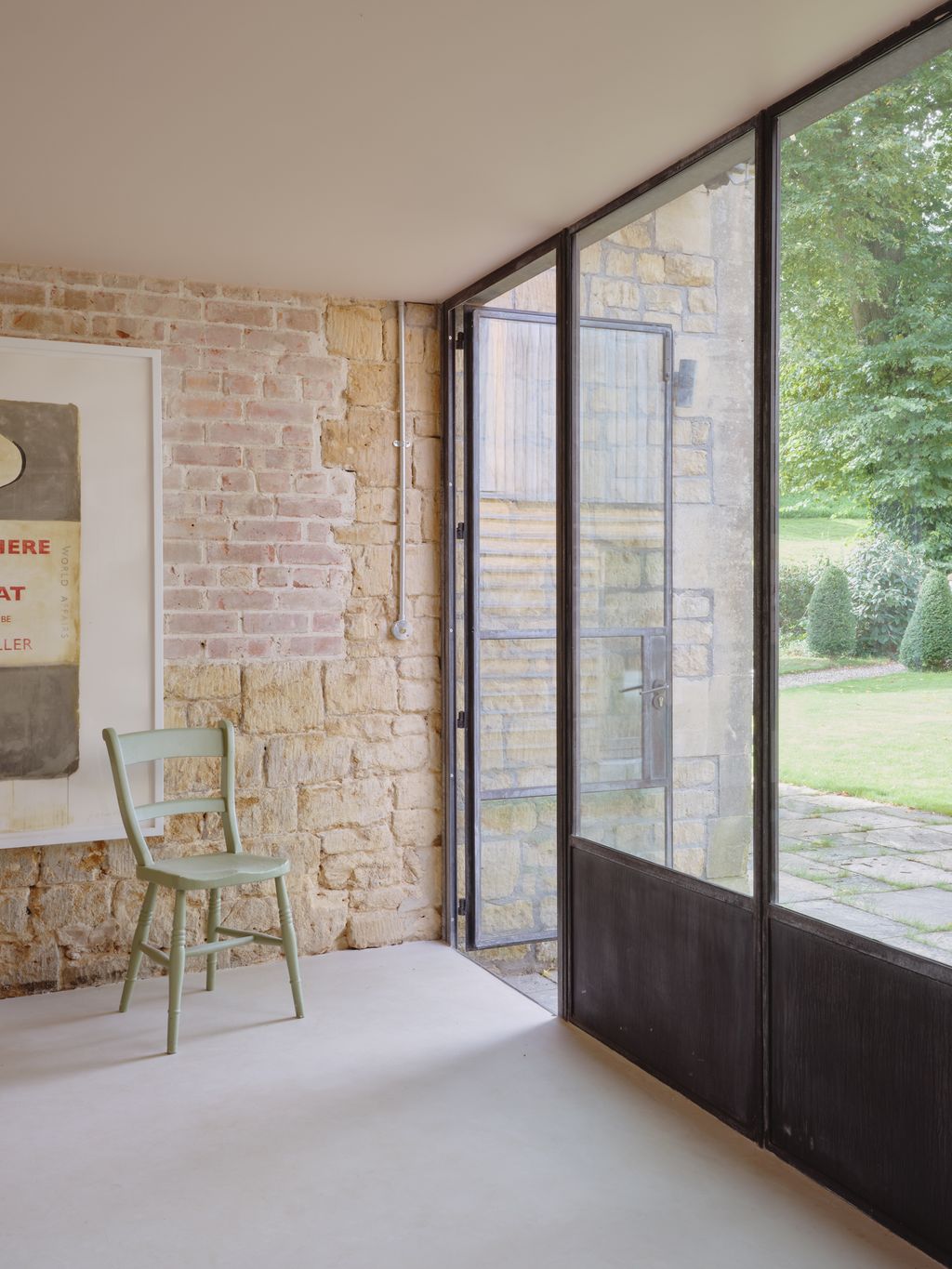 Image may contain Door Chair Furniture Indoors Interior Design Architecture Building Housing Floor and House