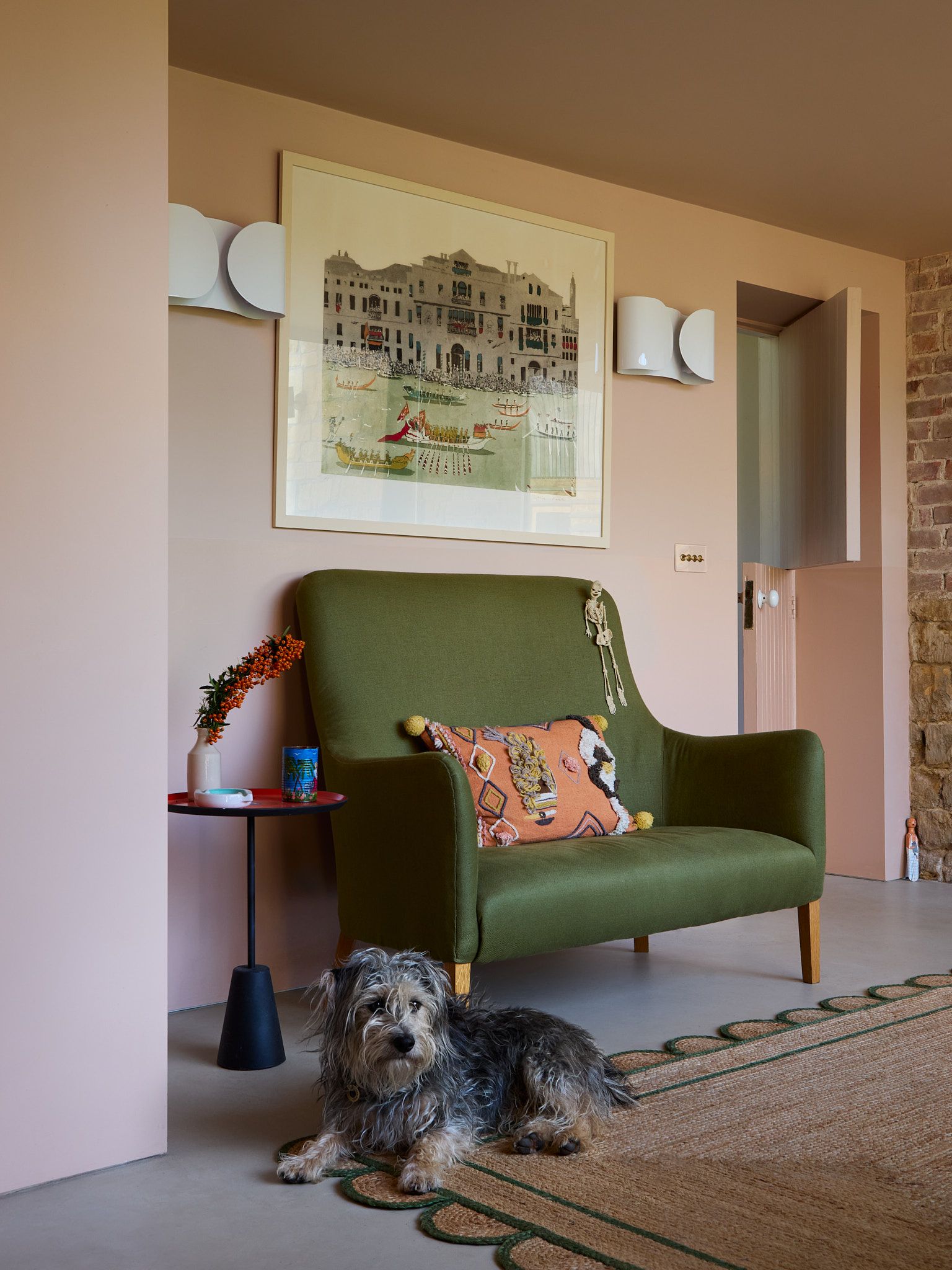 Image may contain Couch Furniture Desk Table Architecture Building Indoors Living Room Room Art and Painting