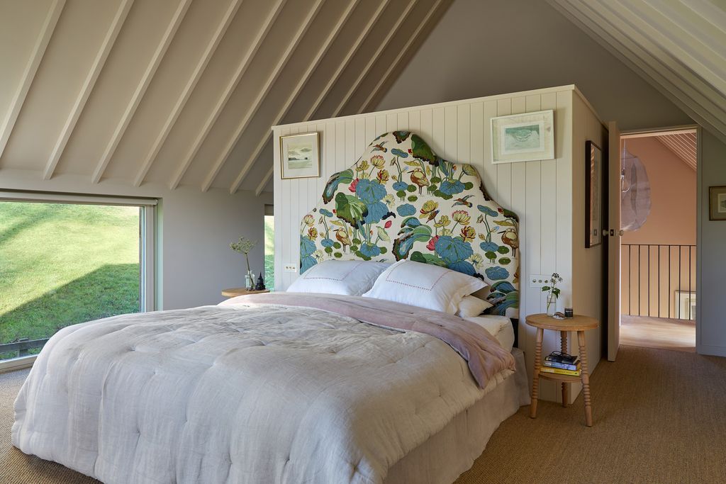 Image may contain Indoors Interior Design Bed Furniture Architecture Building House Housing Loft Room and Art