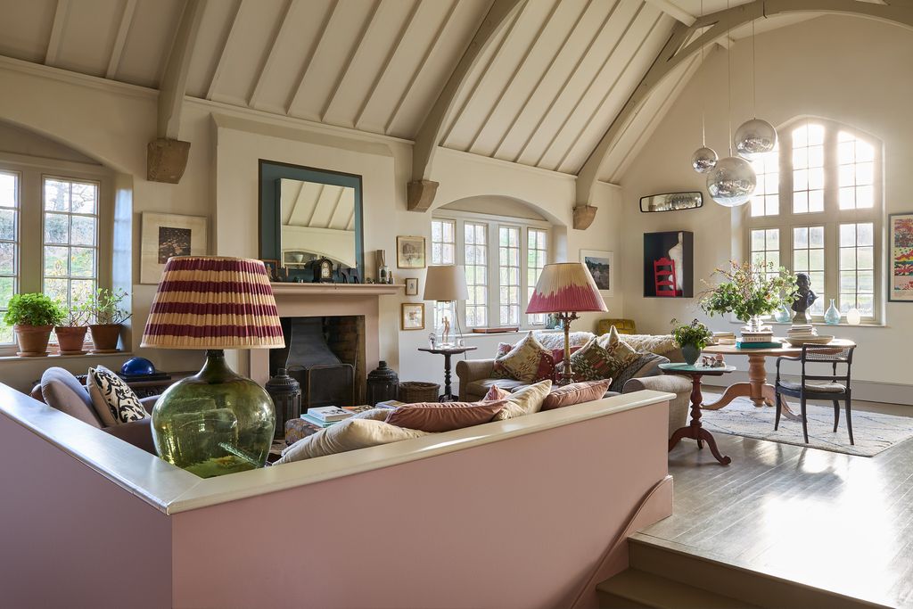 Image may contain Lamp Plant Home Decor Chair Furniture Desk Table Art Painting Indoors and Interior Design