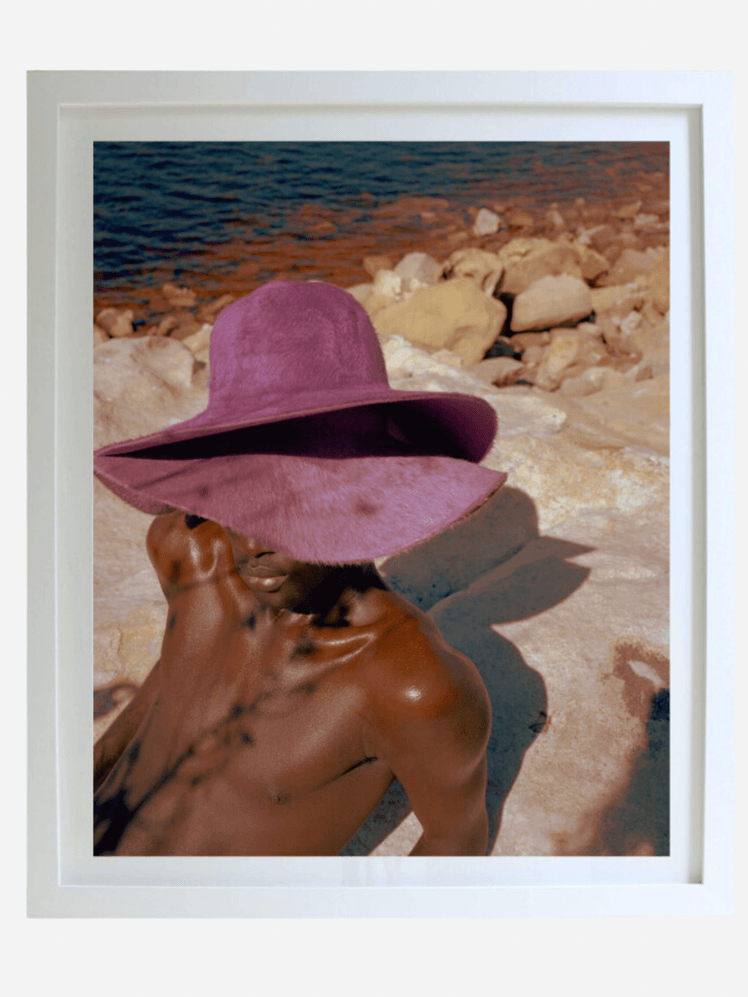 Image may contain: Clothing, Hat, Sun Hat, Adult, and Person