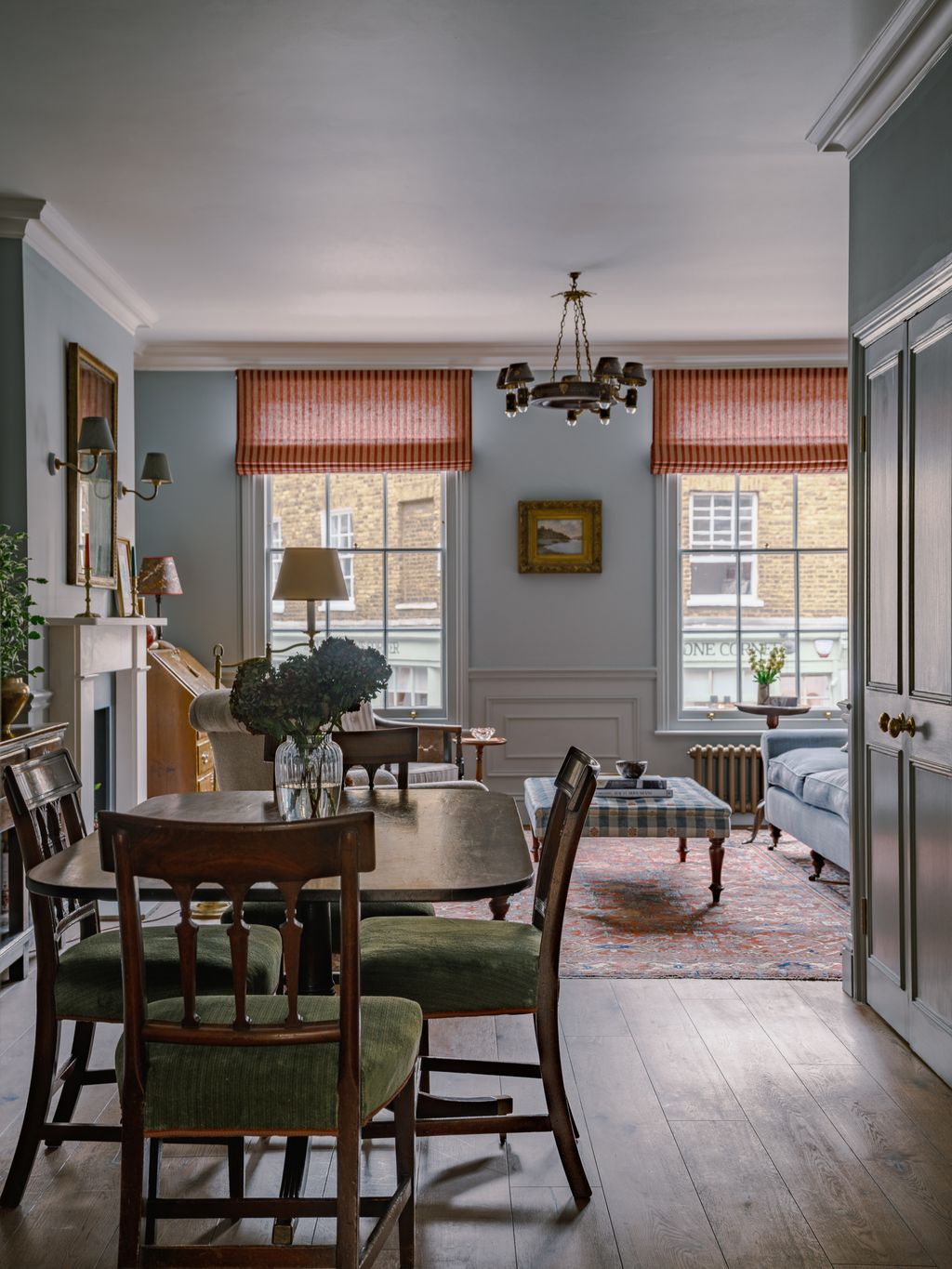 Image may contain Architecture Building Dining Room Dining Table Furniture Indoors Room Table Lamp and Home Decor