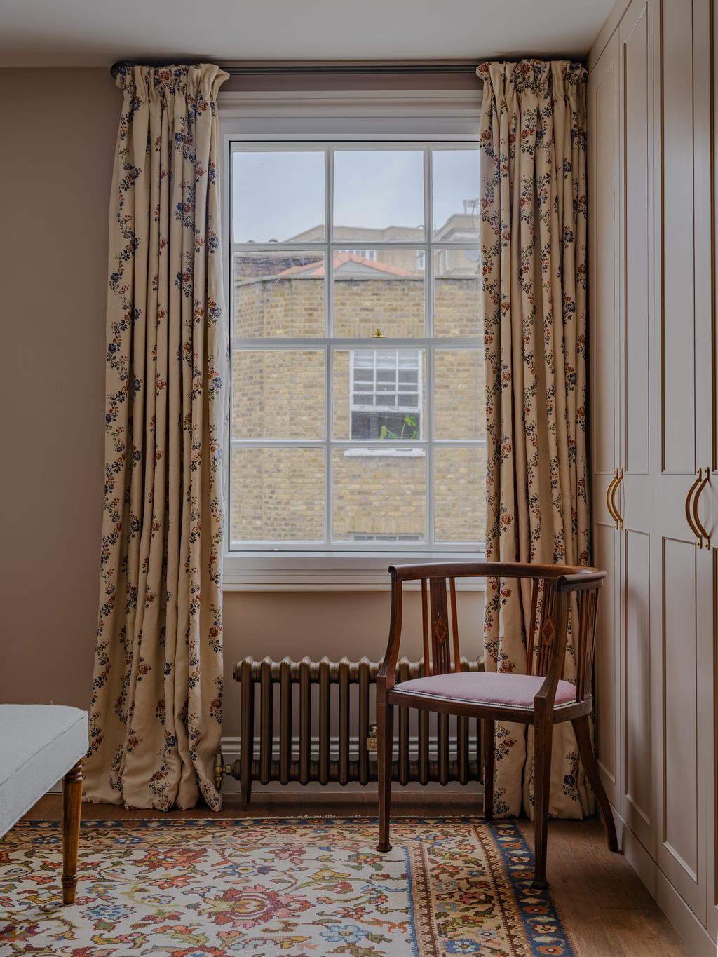 Image may contain Chair Furniture Window Home Decor Rug Texture Indoors and Interior Design