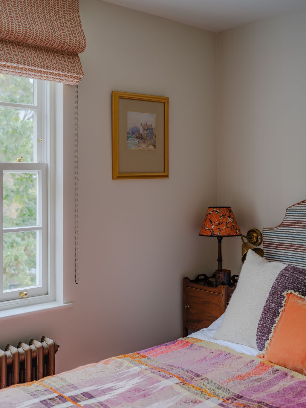 Image may contain Lamp Bed Furniture Art Painting Indoors Interior Design Home Decor Table Lamp Cushion and Window