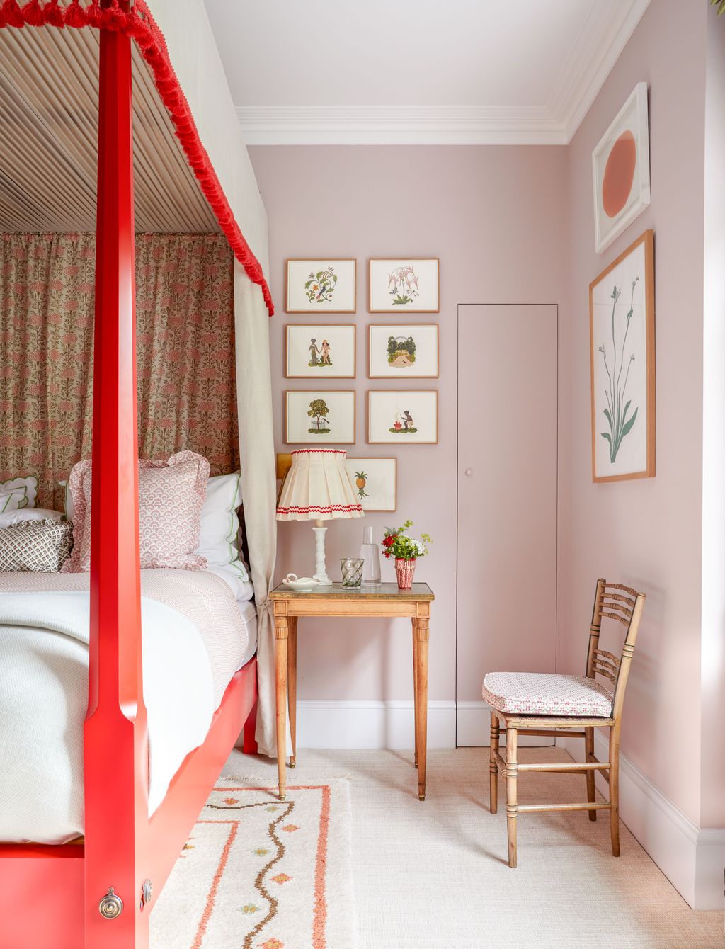 Image may contain Furniture Bed Bedroom Indoors Room Chair Desk Table Lamp Art Painting Cup and Canopy Bed