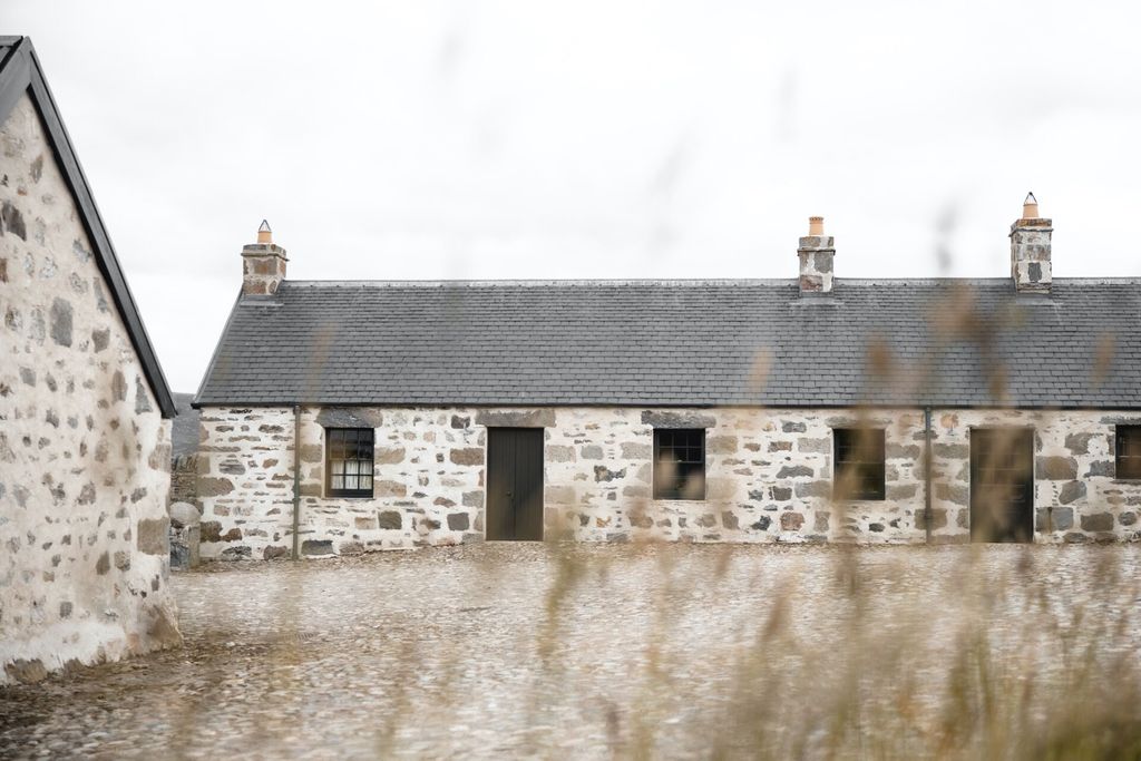 Image may contain Architecture Building Cottage House Housing Monastery Outdoors Shelter Nature and Countryside