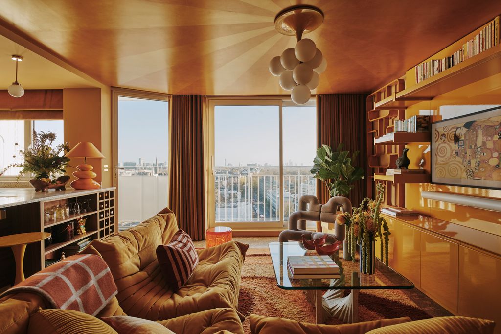 Image may contain Book Publication Architecture Building Furniture Indoors Living Room Room Home Decor and Lamp