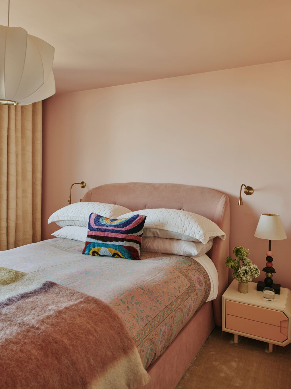 Image may contain Cushion Home Decor Lamp Bed Furniture Pillow Corner Indoors Interior Design and Table Lamp