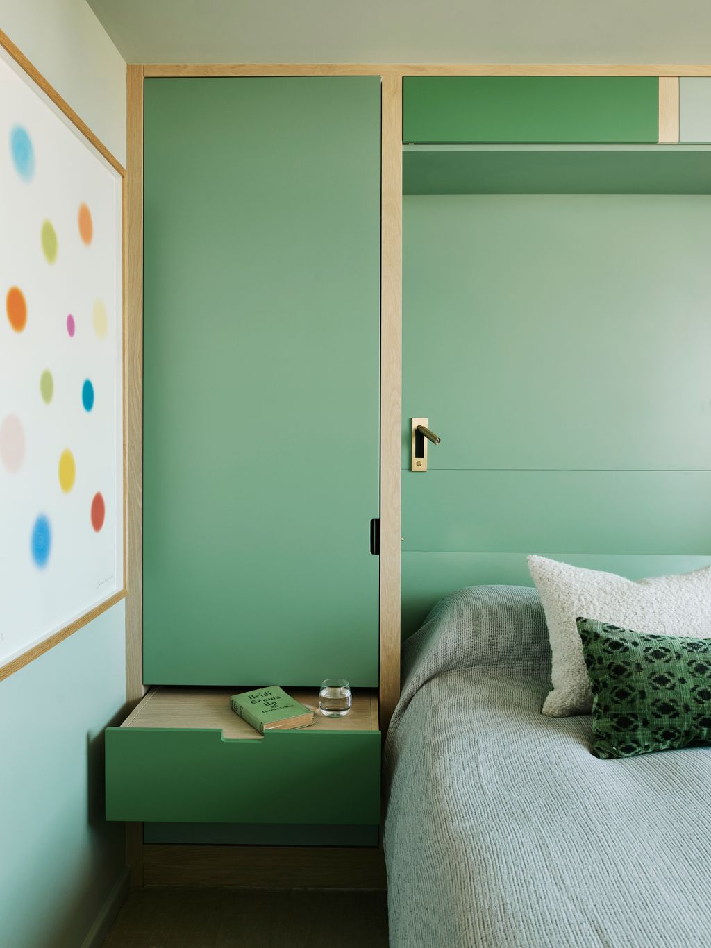 Image may contain Book Publication Indoors Interior Design Furniture Cup Bed Bedroom Room Home Decor and Cushion